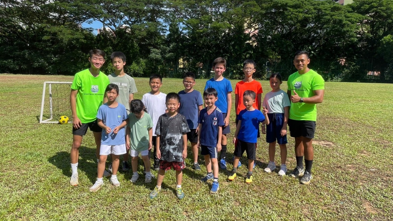 group photo of football holiday camp attendees