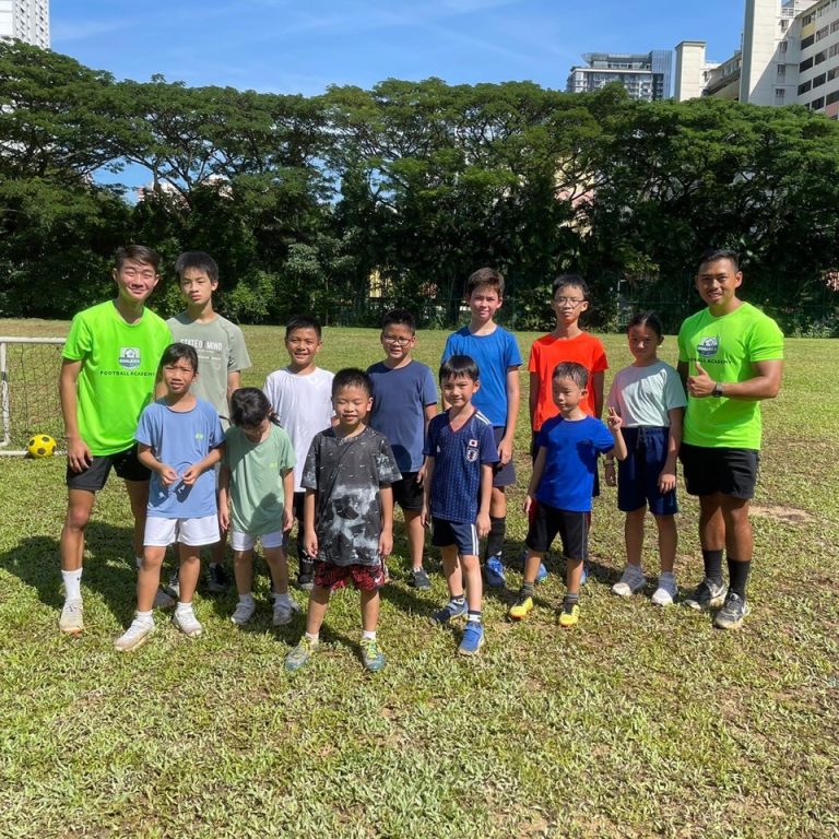 group photo of football holiday camp attendees