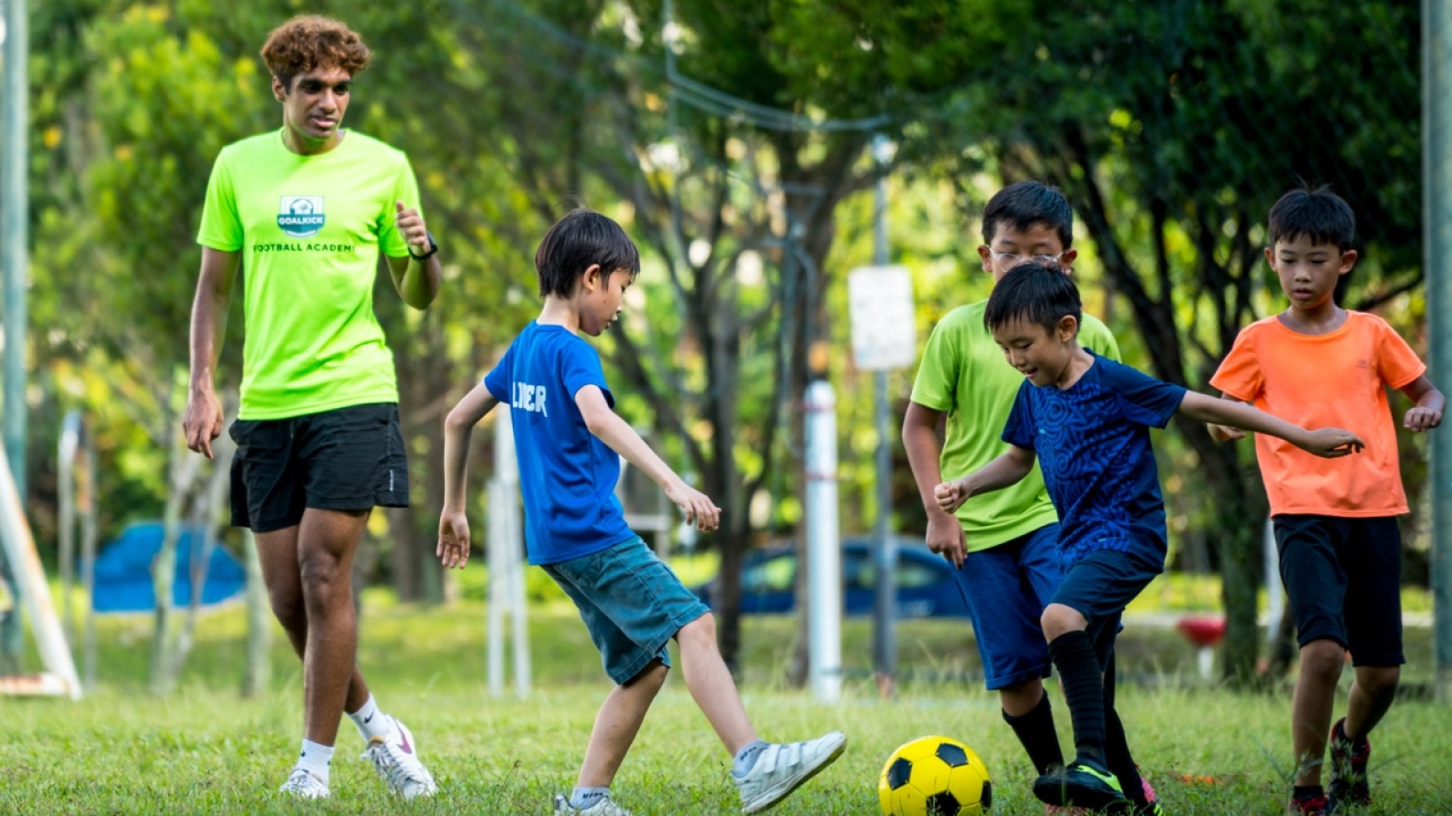 kids playing a football match